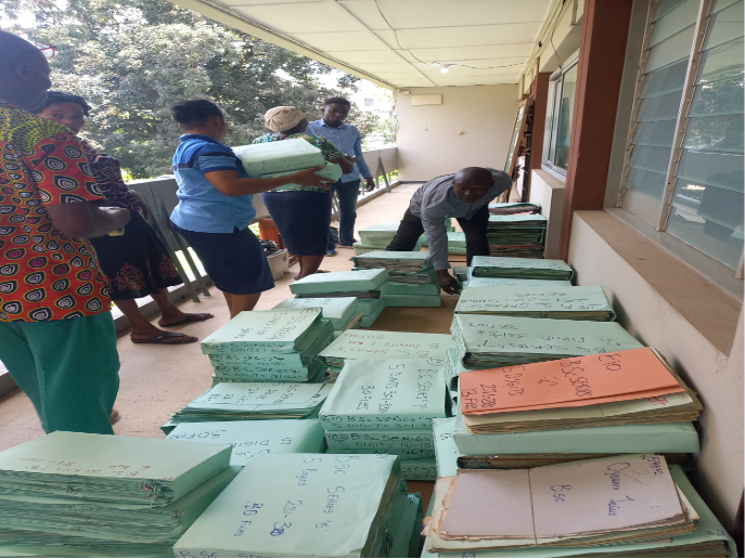 Files arranged into labelled boxes after scanning and renaming